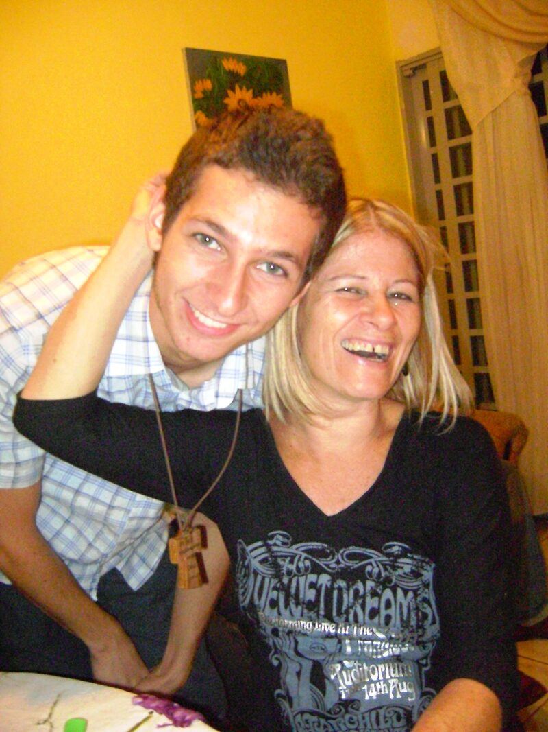 Young Gustavo with his mother in Brazil